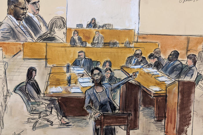 A courtroom artist sketch of opening arguments in the federal case against R. Kelly. Prosecutors called the pop star a "predator" who used his fame to lure girls, boys and women into becoming sex abuse victims.