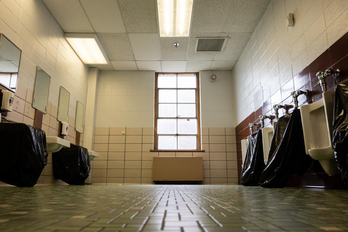 School administrators and police are warning parents about a trend in which students destroy objects in school bathrooms for attention on social media.