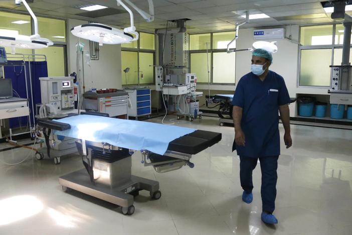 A newly-opened COVID-19 hospital in Kabul. Dr. Wahid Majrooh, the acting minister of public health in Afghanistan, must address the pandemic's toll at a time when the Taliban takeover has triggered a freeze in hundreds of millions of dollars in health-care aid from outside groups.