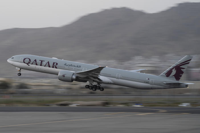 In this Sept. 9, 2021, photo, a Qatar Airways aircraft takes off with foreigners from the airport in Kabul, Afghanistan.