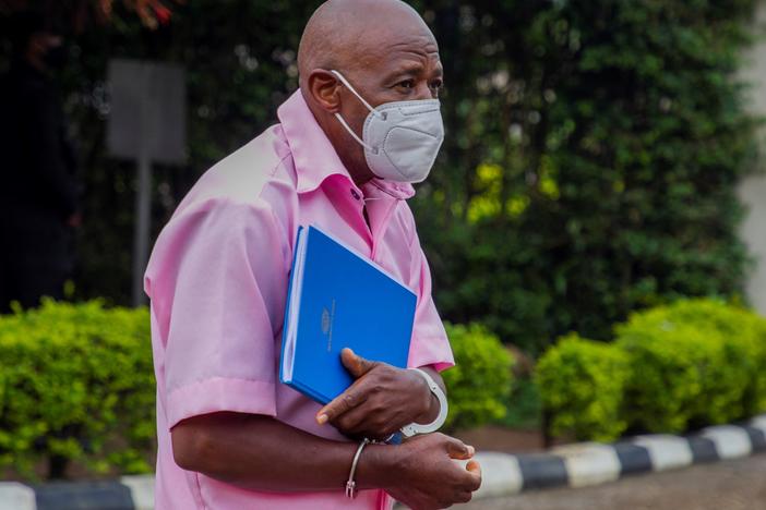 Paul Rusesabagina has been convicted on terrorism charges in Rwanda, after a trial that he and his family say was unfair and politically motivated. He's seen here arriving at a court in Kigali in February.