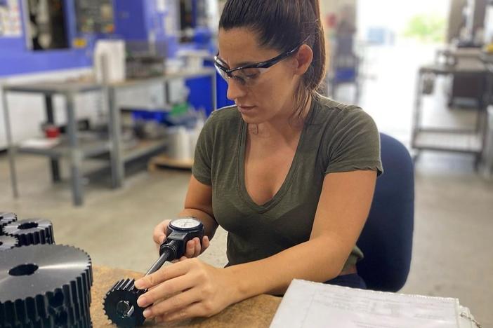 Nicole Wolter at work at her factory in Wauconda, Ill., which makes components for industrial machines. Wolter's company is straining to meet demand as her own suppliers struggle with short staffing.