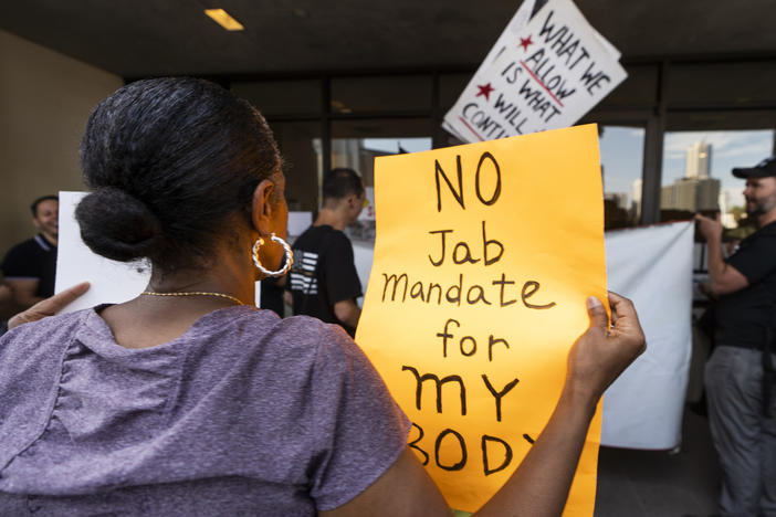 Anti-vaccine mandate protesters rally outside the front doors of the Los Angeles Unified School District, LAUSD headquarters in Los Angeles Thursday Sept. 9, 2021.