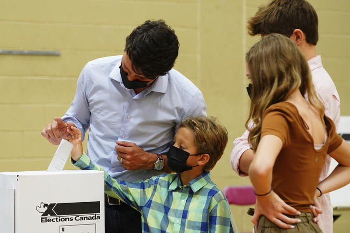 Liberal leader Justin Trudeau casts his ballot in the 44th general federal election. He's joined by his children, Xavier, Ella-Grace and Hadrien in Montreal on Monday.