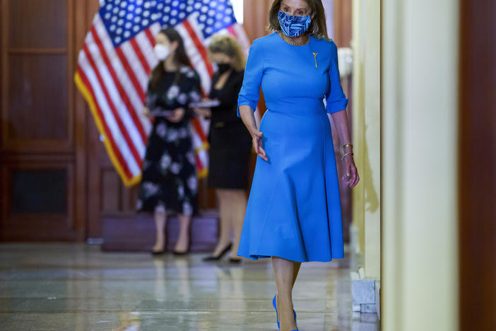 House Speaker Nancy Pelosi, D-Calif., at the U.S. Capitol on Wednesday. The House of Representatives passed a bill to keep the government funded and suspend the debt ceiling, but Republicans are expected to block it in the Senate.