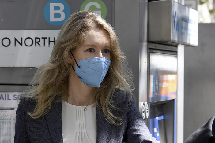 Elizabeth Holmes leaves the federal courthouse in San Jose, Calif., on Sept. 8.