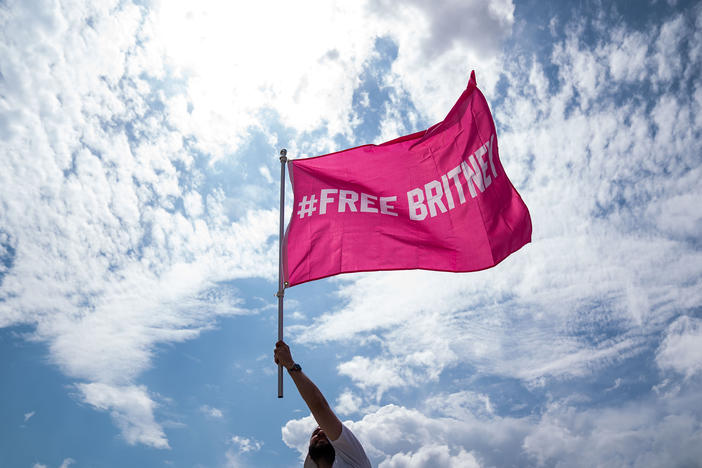 A supporter of pop star Britney Spears participating in a #FreeBritney rally on July 14 in Washington, D.C. When anyone poses a high risk of harm to themselves or others, psychiatrists are obligated to hospitalize them, even against their will. For many patients, paying for that involuntary care leads to long-term financial strain.