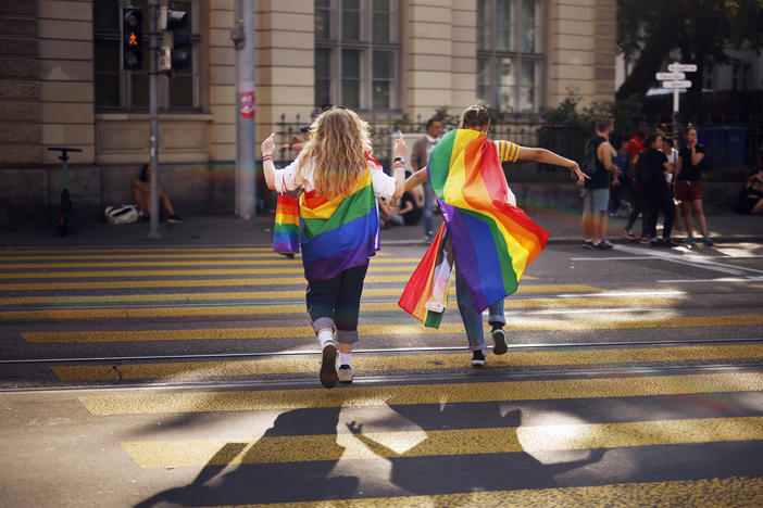 In this Saturday, Sept. 4, 2021 file photo, people take part in the Zurich Pride parade in Switzerland. Swiss voters will wrap up a referendum on Sept. 26, 2021, to decide whether to allow same-sex marriage.