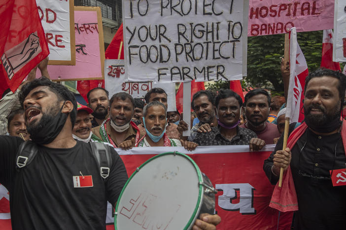 Members of Communist Party of India shout slogans during a protest against farm laws in Mumbai, India Monday, Sept. 27, 2021. The farmers called for a nation-wide strike Monday to mark one year since the legislation was passed, marking a return to protests that began over a year ago.