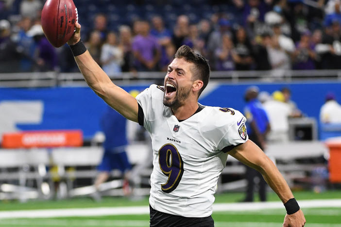 Justin Tucker celebrates after kicking a game-winning field goal from a record 66 yards, giving the Baltimore Ravens a 19-17 win Sunday over the Detroit Lions at Ford Field in Michigan.