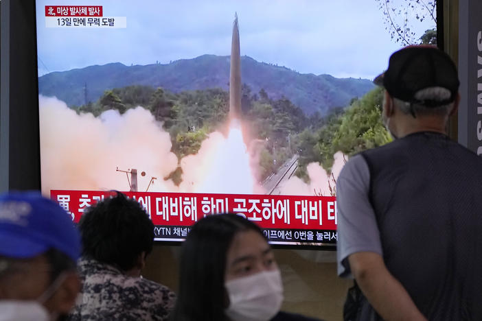 People watch a TV showing a file image of North Korea's missile launch during a news program at the Seoul Railway Station in Seoul, South Korea, Tuesday, Sept. 28. North Korea on Tuesday fired a suspected ballistic missile into the sea, Seoul and Tokyo officials said, the latest in a series of weapons tests by Pyongyang.