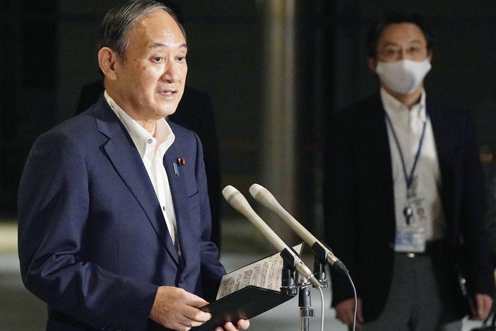 Japanese Prime Minister Yoshihide Suga speaks to reporters about lifting of a state of emergency at his official residence in Tokyo Monday, Sept. 27. Suga announced Tuesday a lifting of the ongoing coronavirus state of emergency and less-stringent measures in all 27 prefectures including Tokyo when they expire at the end of September.
