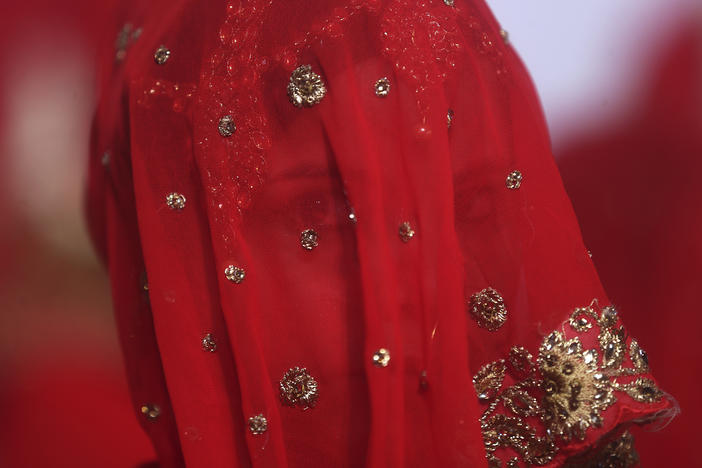 A bride in India. There's a movement to get the government to raise the legal age of marriage for women from 18 to 21.