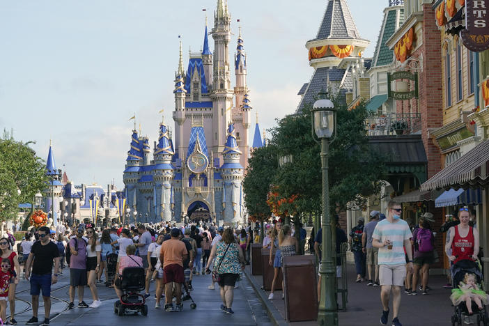 Guests stroll along Main Street at the Magic Kingdom theme park at Walt Disney World. The park celebrates its 50th anniversary on Oct. 1, 2021.