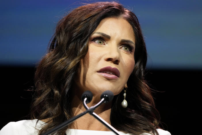 South Dakota Gov. Kristi Noem speaks during the Family Leadership Summit on July 16 in Des Moines, Iowa. Questions are floating around whether Noem had anything to do with the forced retirement of a state official after Noem's daughter was denied a real estate appraiser's license.