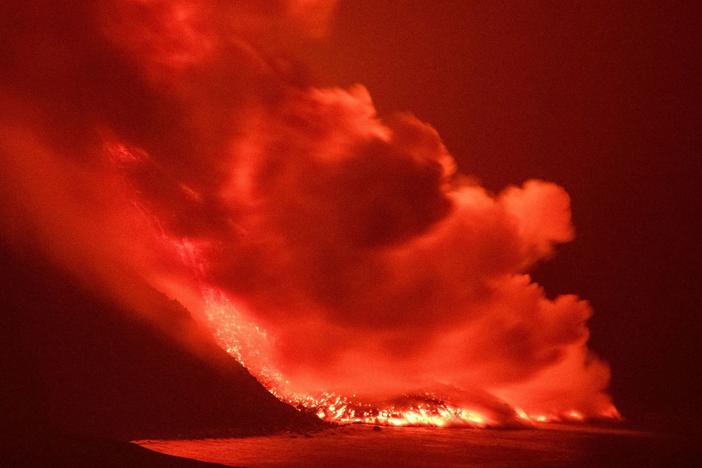 Lava from a volcano reaches the sea on the island of La Palma, Spain, in the early hours of Wednesday, prompting concerns about toxic gas.