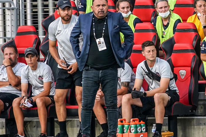 Coach Richie Burke of the Washington Spirit watches the play during a game against the North Carolina Courage at Audi Field on July 10, 2021 in Washington, DC.