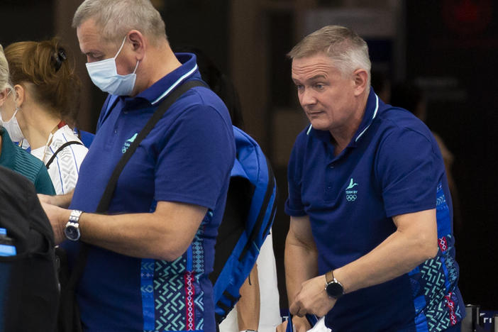 Belarus track coaches Artur Shimak (left) and Yury Maisevich are now under investigation, Olympics officials announced on Thursday. The pair are seen here last month at a checkpoint at a Tokyo airport.