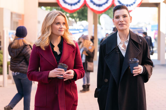 Bradley (Reese Witherspoon) and Laura (Julianna Margulies) do some talking at the Iowa caucuses.