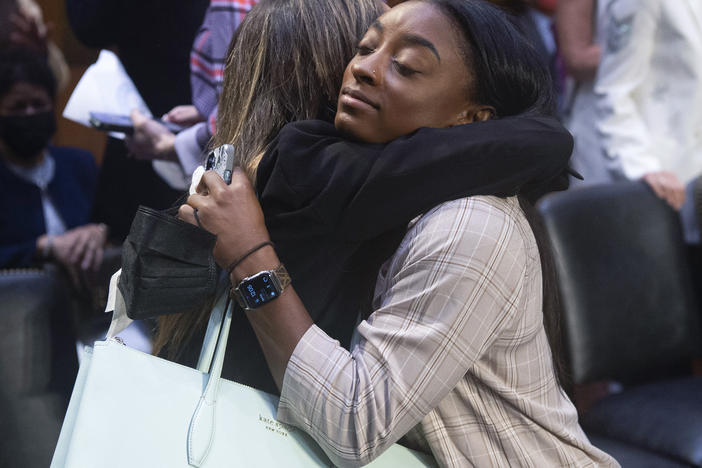 United States gymnasts Kaylee Lorincz and Simone Biles hug after a Senate Judiciary hearing about the Inspector General's report on the FBI's handling of the Larry Nassar investigation on Sept. 15, 2021.