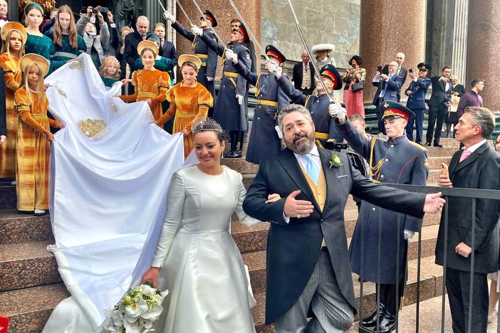 Grand Duke George Mikhailovich Romanov and his Italian bride, Victoria Romanovna Bettarini, exit St. Isaac's Cathedral following their wedding in St. Petersburg, Russia.