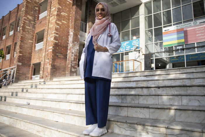 Dr. Saleema Rehman stands outside Holy Family Hospital in Rawalpindi, Pakistan. The Afghan refugee of Turkmen origin has won UNHCR's Nansen Award for her work helping refugee moms and babies in Pakistan.