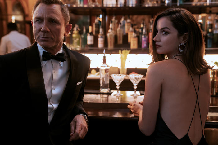 Bond (Daniel Craig) teams up with secret agent Paloma (Ana de Armas) in Havana in <em>No Time to Die.</em>