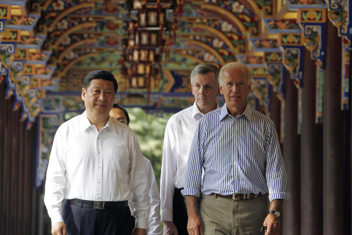 In this 2011 photo, then-U.S. Vice President Joe Biden walks with then-Chinese Vice President Xi Jinping in southwestern China. Both are now presidents of their countries at a time when U.S.-China relations have been growing increasingly tense.