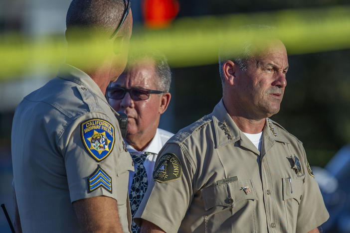 Riverside County Sheriff Chad Bianco, right, with Riverside City Police Chief Sergio G. Diaz and a California Highway Patrol officer, in a photograph taken in 2019.