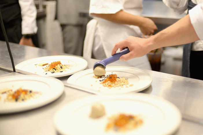 Chefs prepare food at Mexico's Dinner With Enrique Olvera And Jordi Roca during Food Network & Cooking Channel New York City Wine & Food Festival presented By FOOD & WINE at Cosme NYC on October 15, 2015 in New York City. Cosme is one of six U.S. honorees on the 2021 list of the world's 50 best restaurants.