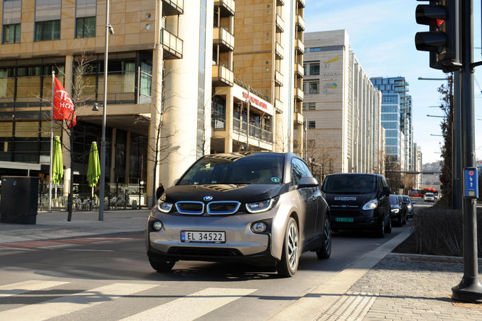 Norway is seeing a record boom in sales of electric cars, which far outpace gas and diesel vehicles. Here, an electric BMW drives on the street in downtown Oslo.