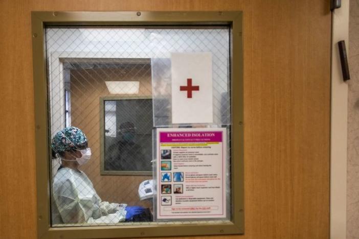 Registered nurse Christie Lindog works at the cardiovascular intensive care unit at Providence Cedars-Sinai Tarzana Medical Center in Tarzana, Calif., on Sept. 2.