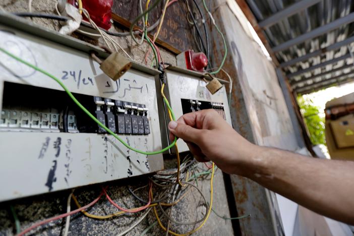 A picture taken on November 4, 2019, shows a circuit breaker of an electric generator supplying homes with electricity in the Lebanese capital Beirut's southern suburbs.