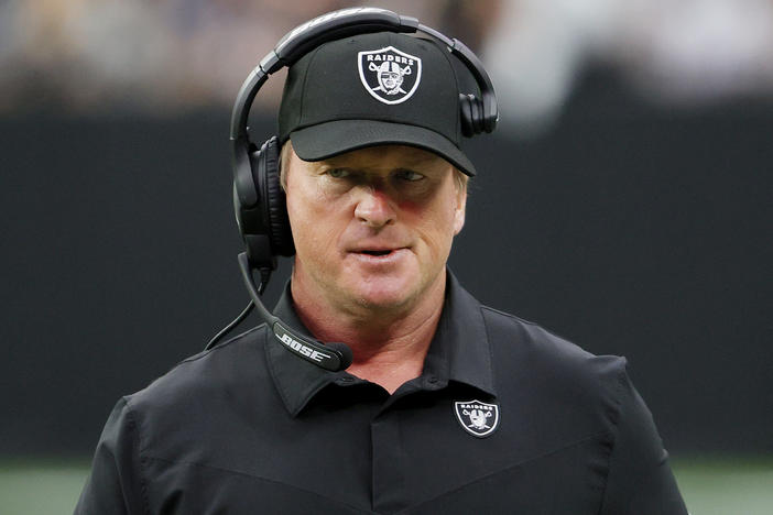 Jon Gruden resigned as coach of the Las Vegas Raiders on Monday night following reports he had sent derogatory and offensive emails. Gruden is seen here on the sidelines against the Chicago Bears on Sunday in Las Vegas, Nev.
