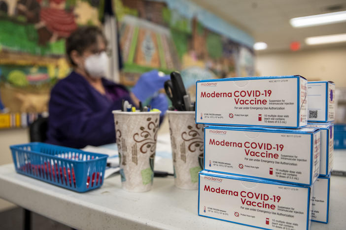 A nurse prepares a dose of the Moderna COVID-19 vaccine at a San Antonio senior center in March. A panel of advisers to the Food and Drug Administration will meet Thursday to review Moderna's booster shot.