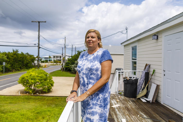 When buying her new home in Big Pine Key, Fla., Amy Tripp closed early, just before federal flood insurance rates rose by thousands of dollars. Her rate will still go up more slowly over time.