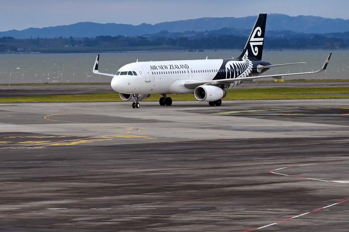 An Air New Zealand plane arrives at Auckland Airport on Aug. 9. Some Aucklanders will be able to get their first dose of a COVID-19 vaccine aboard a 787 on Saturday.