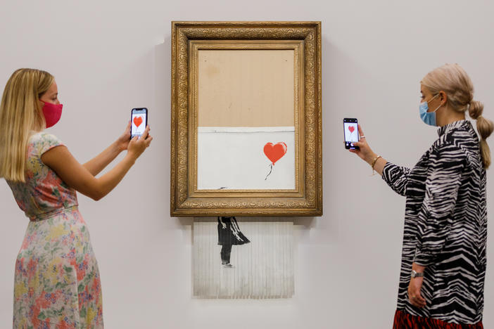 Banksy's "Love is in the Bin" (2018) is installed at Sotheby's on September 03, 2021 in London, England.