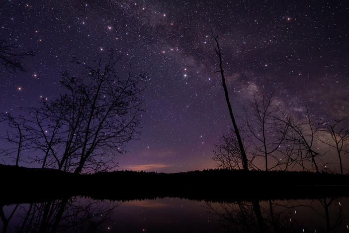 A scenic view of a lake against the sky at night in British Columbia. Earlier this month, a resident of Golden, B.C., woke up to the sound of a crash and found that a meteorite had landed in her bed.