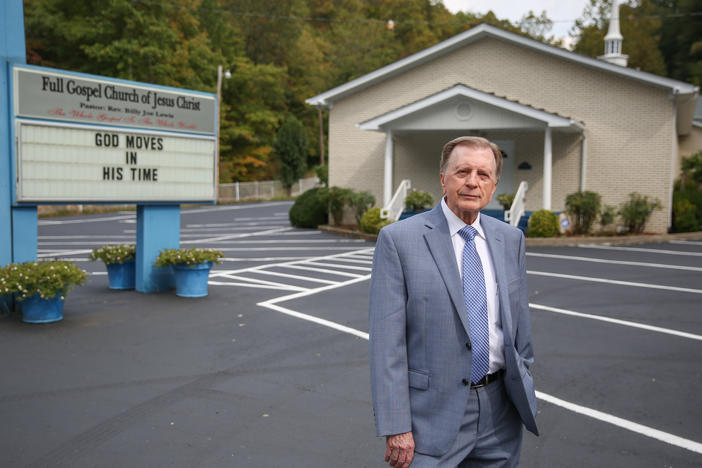 Pastor Billy Joe Lewis was all in favor when a local health worker suggested a COVID-19 vaccine clinic in the parking lot of his church in Smilax, Ky. "We've still got to use common sense," Lewis says. "Anything that can ward off suffering and death, I think, is a wonderful thing."