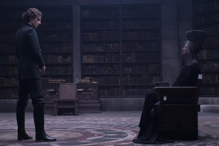 Paul (Timothee Chalamet) and the Bene Gesserit Reverend Mother (Charlotte Rampling) regard each other warily in DUNE.