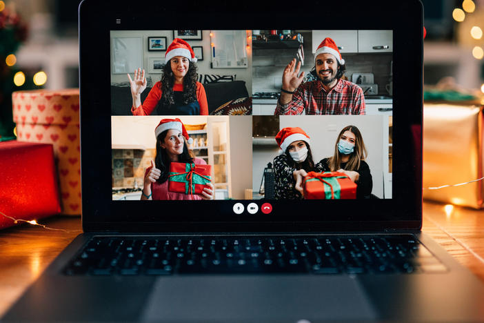 A video call on a laptop screen during Christmas. The Centers for Disease Control and Prevention released new guidance on Friday for safely celebrating the upcoming holiday season.