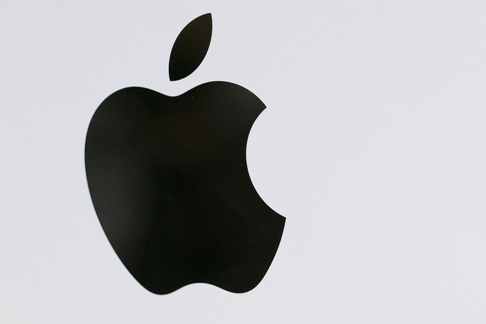 The Apple logo is displayed on a Mac Pro desktop computer on May 21 in New York.