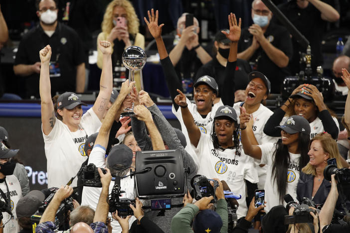 The Chicago Sky celebrate after winning Game Four of the 2021 WNBA Finals against the Phoenix Mercury on Sunday at the Wintrust Arena in Chicago, Illinois. It's the city's first-ever WNBA title.