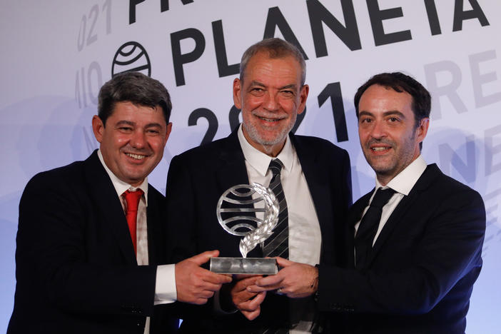The writer Carmen Mola, pseudonym of the writers Jorge Diaz, Agustin Martinez and Antonio Mercero, winner of the 70th edition of the Planeta Novel Prize, gives a press conference after the award ceremony, at the Museu Nacional d'Art de Catalunya, on 15 October 2021, in Barcelona, Catalonia.