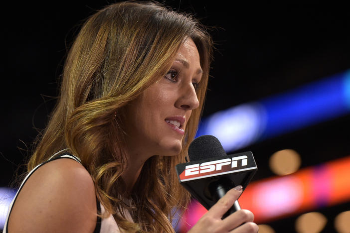 ESPN reporter Allison Williams reports from a college basketball tournament at Barclays Center in Brooklyn, N.Y., on March 8, 2017. Williams said in a recent Instagram video that she is leaving ESPN due to the company's vaccine mandate.