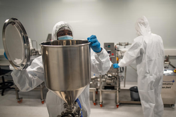 Members of a team at the Afrigen Biologics and Vaccines lab in Cape Town, South Africa. The World Health Organization has enlisted the company to replicate Moderna's COVID-19 vaccine.