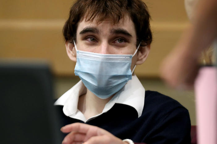Nikolas Cruz pleaded guilty to 17 counts of murder in the Parkland school shootings on Wednesday. He's seen here sitting at the defense table in the Broward County Courthouse in Fort Lauderdale, Fla., on Oct. 6.