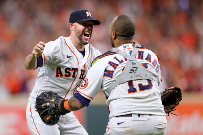 Ryan Pressly of the Houston Astros celebrates with Martin Maldonado after the final out in the ninth inning, defeating the Boston Red Sox 5-0 on Friday  and advancing to the World Series.