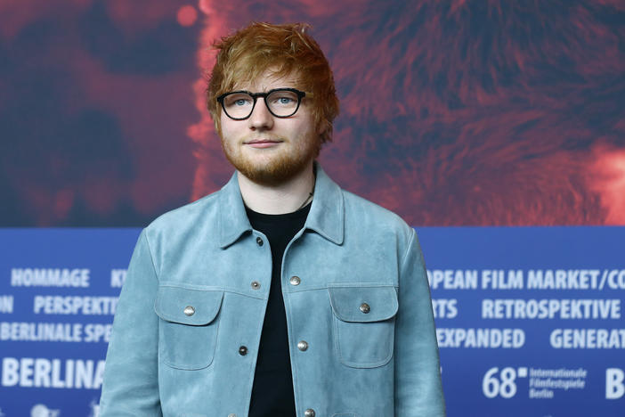 Ed Sheeran, pictured in 2018 at the Berlin International Film Festival, says he has tested positive for the virus that causes COVID-19 just days ahead of the release of his fourth album.